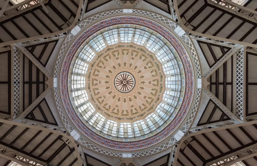 The glass and ceramic dome of the Central Market in Valencia, seen from below